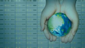 hands holding the Earth with a background of Eco friendly Safe deposit boxes in Manchester.